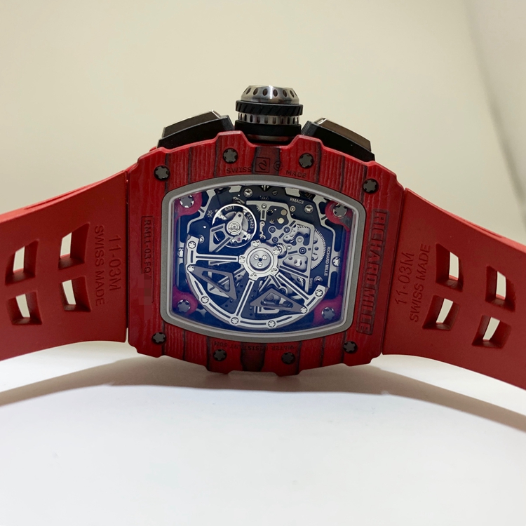 RICHARD MILLE 理查德米勒 男士系列，RM11-03，红魔。49.94 x 44.5毫米表径，NTPT表壳，镂空酒桶型面盘，12点位置日期显示，计时功能，自动上弦机械机芯。 全套附件齐全。