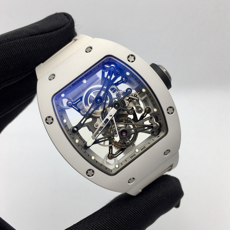 RICHARD MILLE 理查德米勒 男士系列，RM 038。48x39.7毫米表径，镁合金表壳，全镂空酒桶型面盘，陀飞轮装置，RM 038手动上弦机械机芯，动力储备48小时。 单表无附件。
