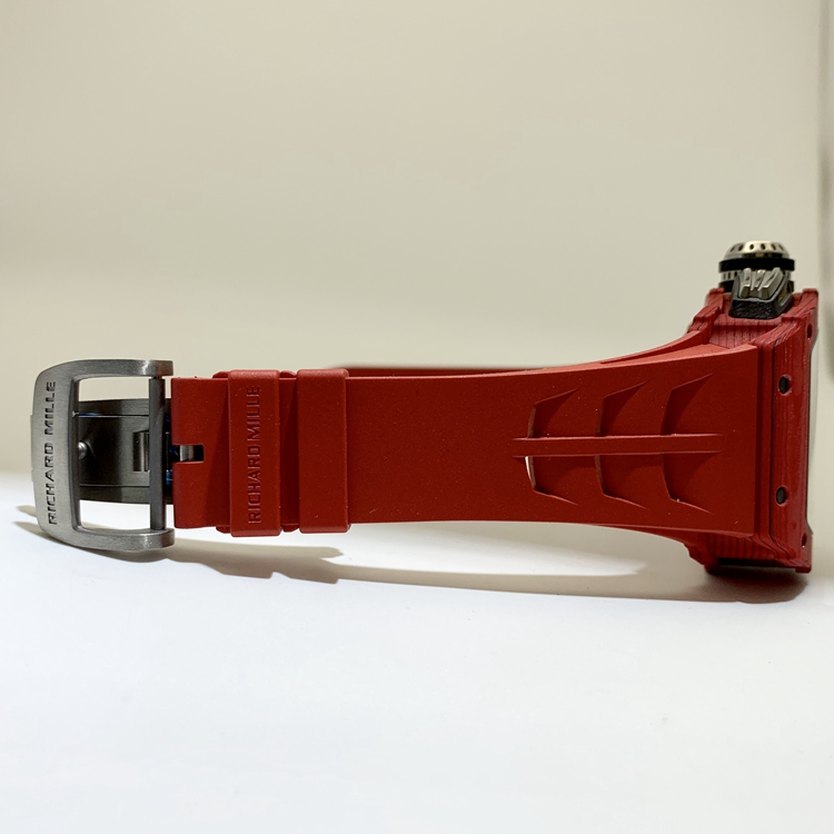 RICHARD MILLE 理查德米勒 男士系列，RM11-03，红魔。49.94 x 44.5毫米表径，NTPT表壳，镂空酒桶型面盘，12点位置日期显示，计时功能，自动上弦机械机芯。 全套附件齐全。