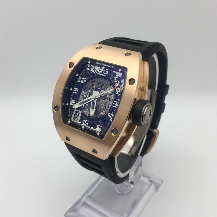 RICHARD MILLE 理查德米勒 男士系列，RM 010。48* 39.30毫米表径，18K玫瑰金表壳，酒桶型镂空面盘，7点位置日期显示，自动上弦机械机芯。专柜定价：656000元。 单表附盒子。