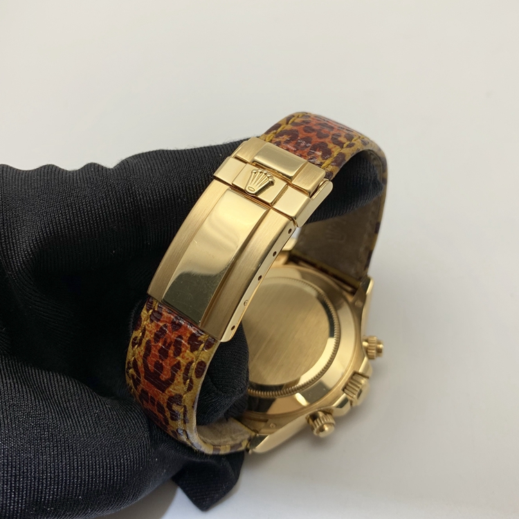 Rolex 劳力士 宇宙计型迪通拿系列，116598 SACO豹纹。40毫米表径，18K黄金，表圈镶有干邑长方形黄色蓝宝石，豹纹面盘，8颗钻石时标，计时功能，自动上弦机械机芯。专柜定价：548500元。 单表无附件。