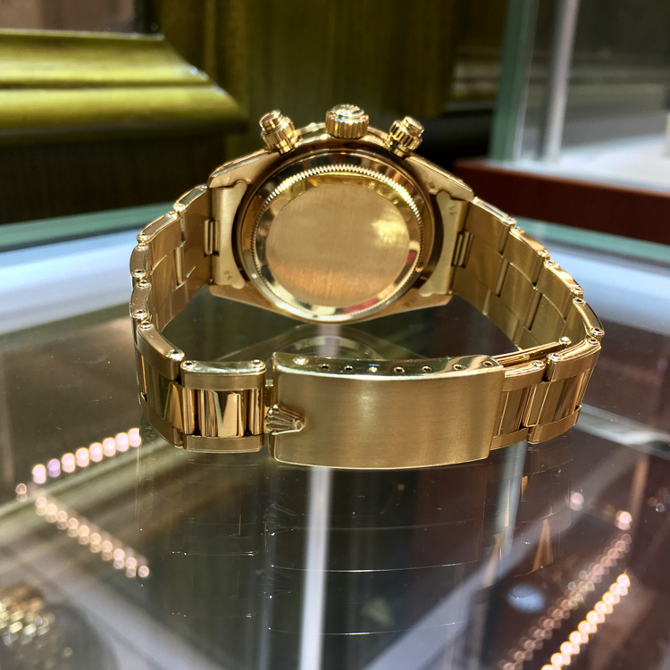 Rolex 劳力士 宇宙计型迪通拿系列，6265。37毫米表径，18K黄金表壳，黄色面盘，表盘配蜗形小秒针盘，中央时、分及秒针；计时功能，自动上弦机械机芯。 单表无附件。