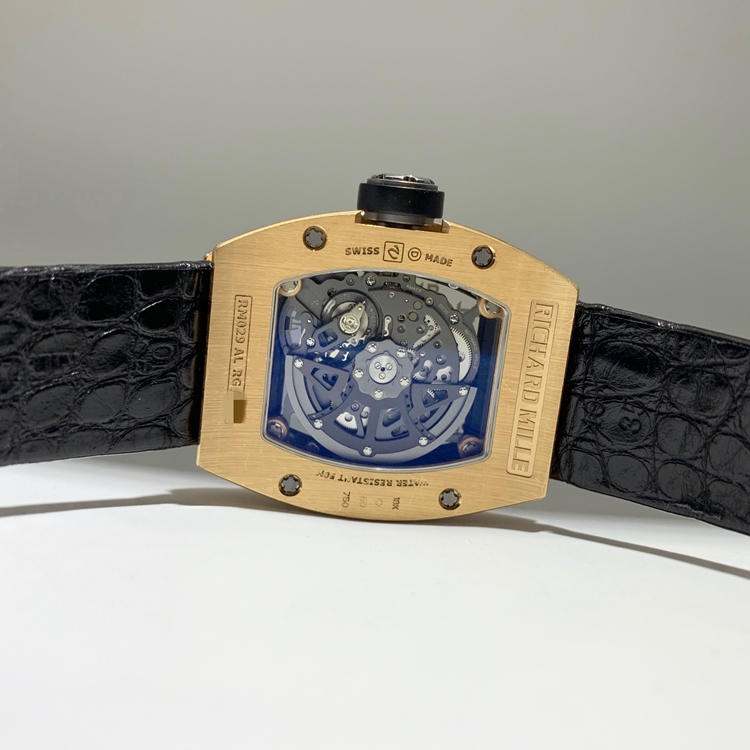 RICHARD MILLE 理查德米勒 男士系列，RM 029。47.5*38.5毫米表径，18K玫瑰金表壳，镂空酒桶型面盘，四点位置日期显示，自动上弦机械机芯。 单表无附件。