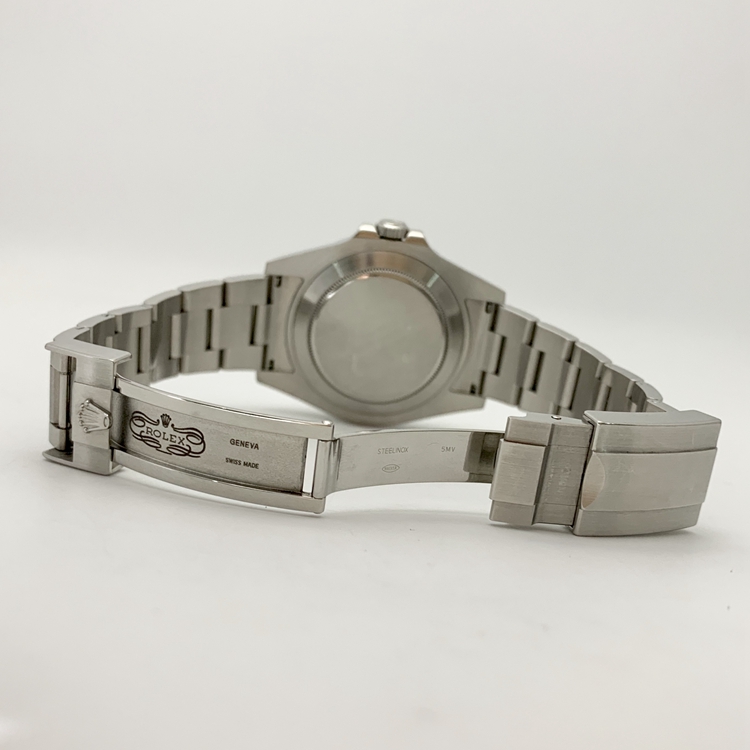Rolex 劳力士 探险家型系列，216570-77210。42毫米表径，精钢表壳，黑色面盘，配有大箭头的橙色24小时指示针，3点位置日期显示、双时区功能，cal.3187自动上弦机械机芯。专柜定价：63100元。 单表无附件。