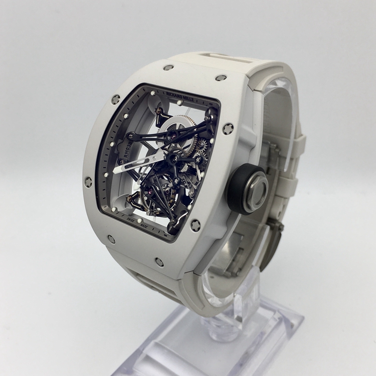 RICHARD MILLE 理查德米勒 男士系列，RM 038。48x39.7毫米表径，镁合金表壳，全镂空酒桶型面盘，陀飞轮装置，RM 038手动上弦机械机芯，动力储备48小时。 单表无附件。