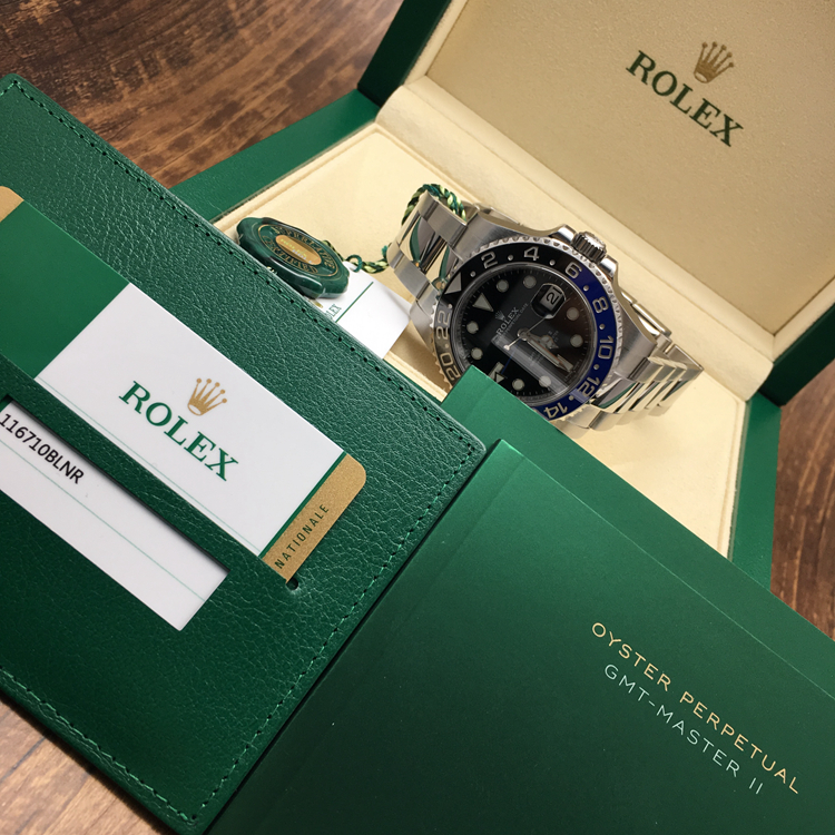 Rolex 劳力士 格林尼治型II系列，116710BLNR-78200。40毫米表径，精钢表壳，24小时刻度双向旋转外圈；双色（蓝、黑）Cerachrom陶质字圈，镌有数字及刻度，黑色面盘，中央时、分及秒针；24小时显示；瞬时变更独立指针显示第二时区时间；瞬跳日历；秒针暂停功能以准确调校时间，自产3186型自动上弦机械机芯，动力储备约48小时，专柜定价：69300元。 全套附件齐全。
