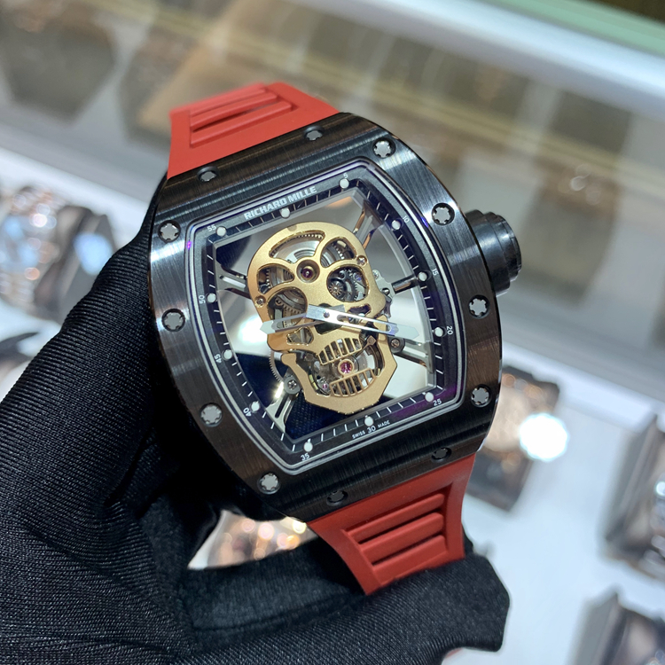 RICHARD MILLE 理查德米勒 ，RM 52-01。42.7×50毫米表径，陶瓷表壳，镂空酒桶型面盘，陀飞轮装置，RM052手动上弦机械机芯，动力储备48小时。 全套附件齐全。