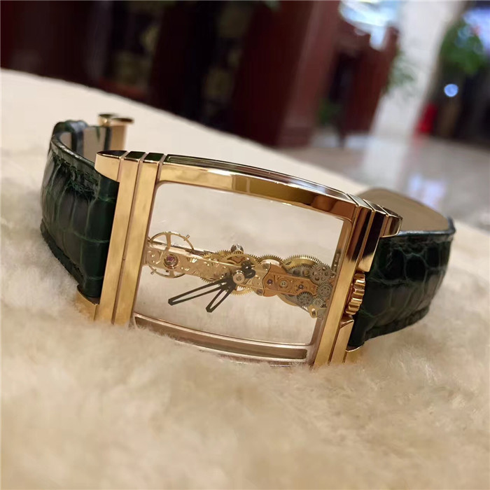 CORUM 昆仑 CORUM  Bridges 昆仑桥系列，113.550.55/0001。32x50毫米表径，全镂空酒桶形，18k玫瑰金壳扣。CO113 自产手动上弦机械机芯，动力储备40小时。 
