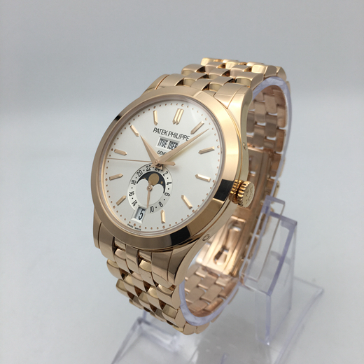 PATEK PHILIPPE 百达翡丽 复杂功能系列，5396R-010。38.5毫米表径，18K玫瑰金表壳，莹白表盘和金质立体时标，视窗式星期、日期和月份显示，以及月相显示。自动上弦机械机芯。  全套附件齐全。