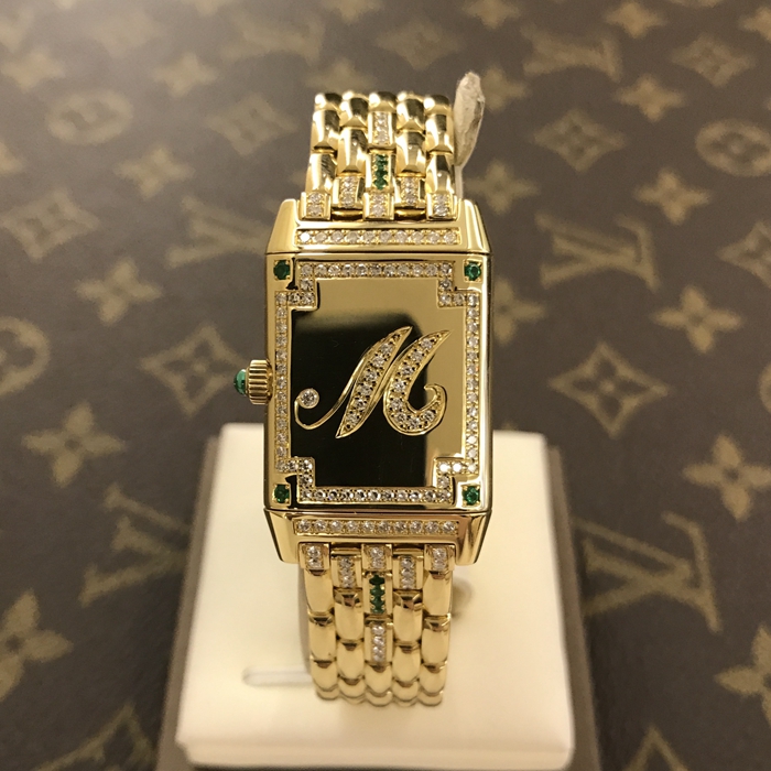 Jaeger-LeCoultre 积家 翻转系列 267.1.86。33X20.5毫米表径，18K黄金表壳，绿宝石镶钻，蓝宝石水晶玻璃表镜，精准石英机芯。 单表无附件。