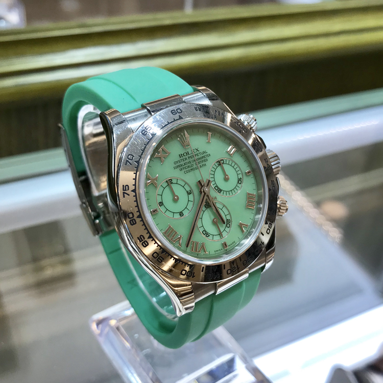 Rolex 劳力士 宇宙计型迪通拿系列，116519。40毫米表径。18K白金表壳，绿色面盘，罗马数字时标，6点位置小秒针显示，30分钟和12小时计时分别设于3点和9点位置，计时功能，自动上弦机械机械。 单表无附件。
