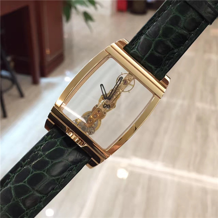 CORUM 昆仑 CORUM  Bridges 昆仑桥系列，113.550.55/0001。32x50毫米表径，全镂空酒桶形，18k玫瑰金壳扣。CO113 自产手动上弦机械机芯，动力储备40小时。 