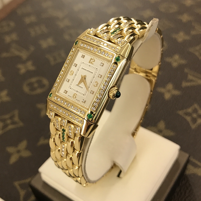 Jaeger-LeCoultre 积家 翻转系列 267.1.86。33X20.5毫米表径，18K黄金表壳，绿宝石镶钻，蓝宝石水晶玻璃表镜，精准石英机芯。 单表无附件。
