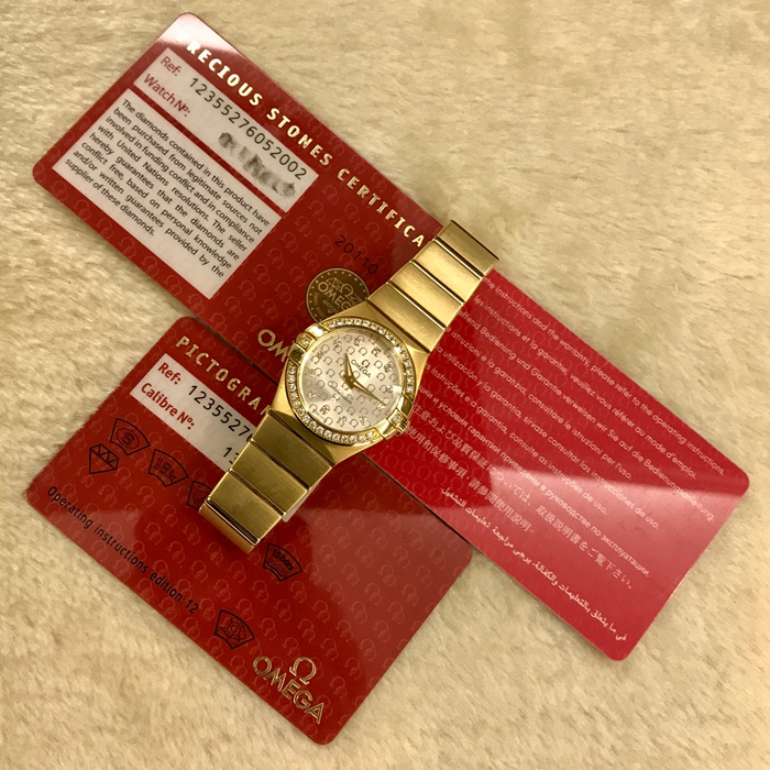 Omega 欧米茄 星座系列，123.55.27.60.52.002。27毫米表径，18K黄金钻圈钻刻，银灰色面盘，精准石英机芯。 未使用品全套附件齐全。