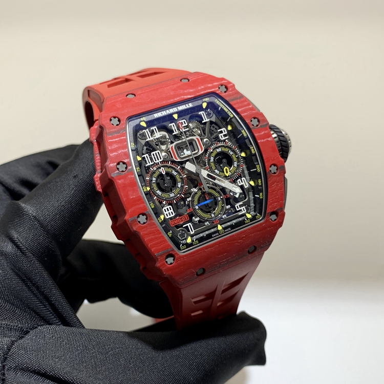 RICHARD MILLE 理查德米勒 男士系列，RM11-03，红魔。49.94 x 44.5毫米表径，NTPT表壳，镂空酒桶型面盘，12点位置日期显示，计时功能，自动上弦机械机芯。 全套附件齐全。