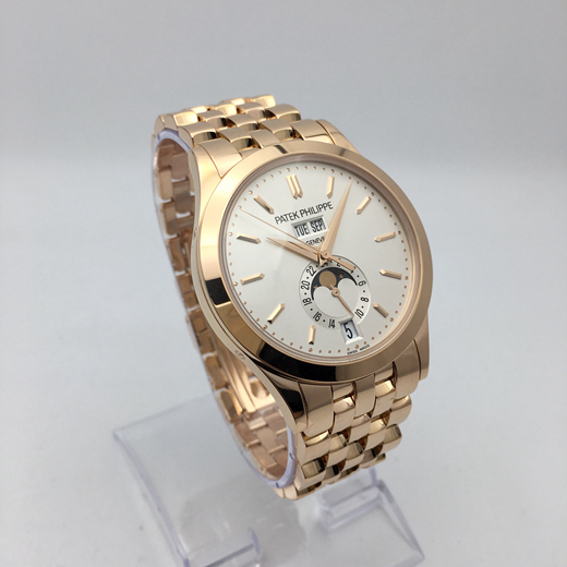 PATEK PHILIPPE 百达翡丽 复杂功能系列，5396R-010。38.5毫米表径，18K玫瑰金表壳，莹白表盘和金质立体时标，视窗式星期、日期和月份显示，以及月相显示。自动上弦机械机芯。  全套附件齐全。