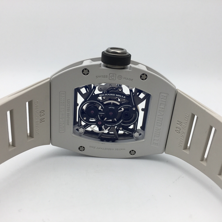 RICHARD MILLE 理查德米勒 男士系列，RM 038。48x39.7毫米表径，镁合金表壳，全镂空酒桶型面盘，陀飞轮装置，RM 038手动上弦机械机芯，动力储备48小时。 单表无附件。