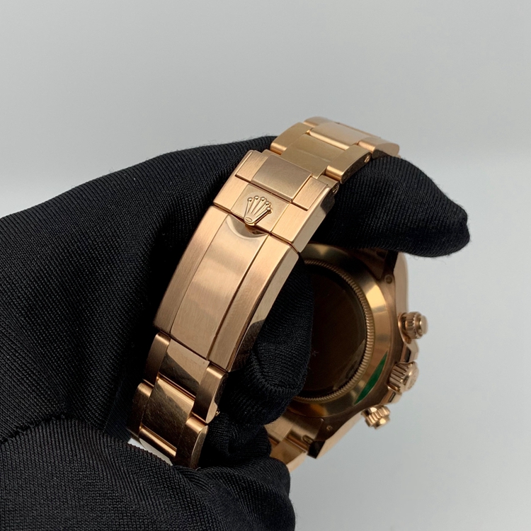 Rolex 劳力士 宇宙计型迪通拿系列，m116505-0011。40毫米表径，18K玫瑰金蚝式表壳，固定外圈连计速刻度，巧克力色面盘，计时功能，Cal.4130自动上弦机械机芯。专柜定价：292500元。 单表无附件。