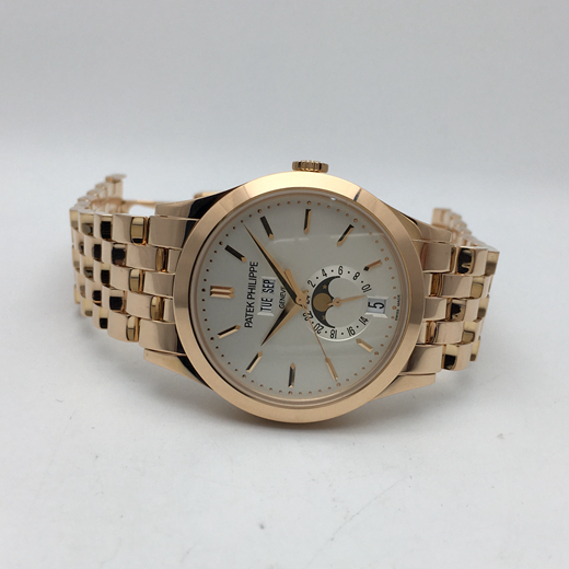 PATEK PHILIPPE 百达翡丽 复杂功能系列，5396R-010。38.5毫米表径，18K玫瑰金表壳，莹白表盘和金质立体时标，视窗式星期、日期和月份显示，以及月相显示。自动上弦机械机芯。  全套附件齐全。