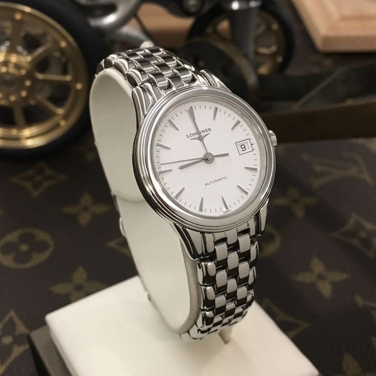 LONGINES 浪琴 优雅系列，L4.274.4.12.6。26毫米表径，精钢表壳，白色面盘，3点位置日期显示，Cal.L595自动上弦机械机芯，动力储备40小时。专柜定价：10900元。 单表无附件。