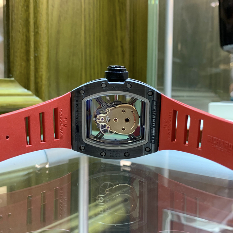 RICHARD MILLE 理查德米勒 ，RM 52-01。42.7×50毫米表径，陶瓷表壳，镂空酒桶型面盘，陀飞轮装置，RM052手动上弦机械机芯，动力储备48小时。 全套附件齐全。