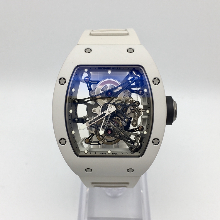 RICHARD MILLE 理查德米勒 男士系列，RM 038。48x39.7毫米表径，镁合金表壳，全镂空酒桶型面盘，陀飞轮装置，RM 038手动上弦机械机芯，动力储备48小时。 单表无附件。