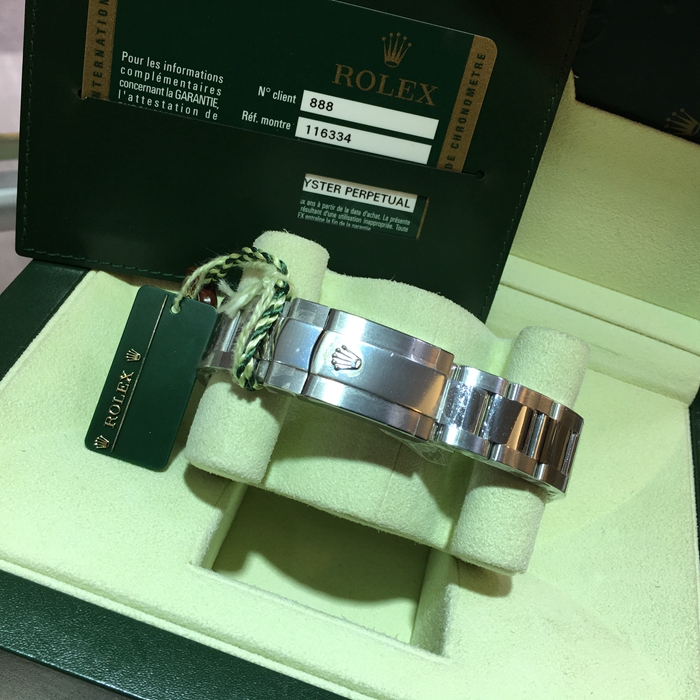 Rolex 劳力士 日志型系列，116334。41毫米表径，18K白金/精钢表壳，深蓝色面盘，罗马数字时标，3点位置日历显示，自产3136型自动上弦机械机芯，动力储备48小时。 未使用品全套附件齐全。