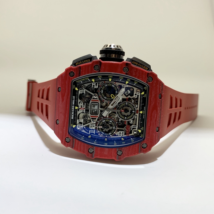 RICHARD MILLE 理查德米勒 男士系列，RM11-03，红魔。49.94 x 44.5毫米表径，NTPT表壳，镂空酒桶型面盘，12点位置日期显示，计时功能，自动上弦机械机芯。 全套附件齐全。