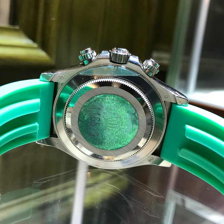 Rolex 劳力士 宇宙计型迪通拿系列，116519。40毫米表径。18K白金表壳，绿色面盘，罗马数字时标，6点位置小秒针显示，30分钟和12小时计时分别设于3点和9点位置，计时功能，自动上弦机械机械。 单表无附件。