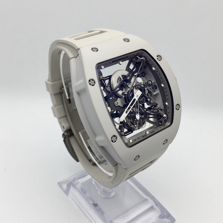 RICHARD MILLE 理查德米勒 男士系列，RM 038。48x39.7毫米表径，镁合金表壳，全镂空酒桶型面盘，陀飞轮装置，RM 038手动上弦机械机芯，动力储备48小时。 单表无附件。