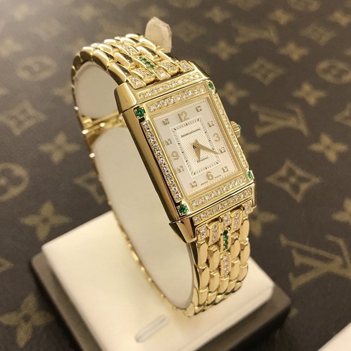 Jaeger-LeCoultre 积家 翻转系列 267.1.86。33X20.5毫米表径，18K黄金表壳，绿宝石镶钻，蓝宝石水晶玻璃表镜，精准石英机芯。 单表无附件。