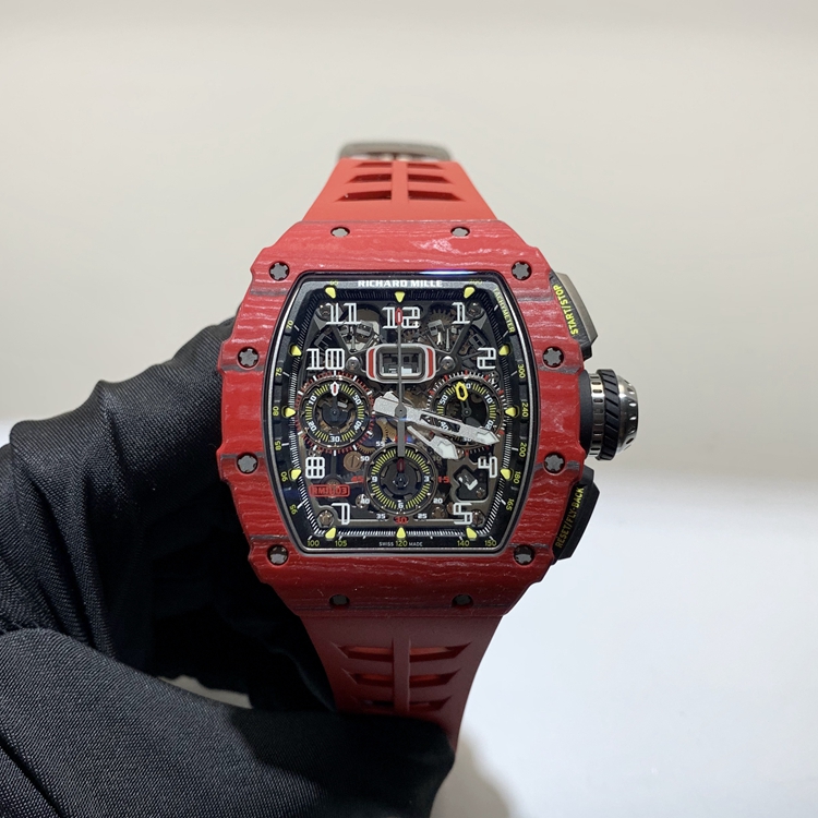 RICHARD MILLE 理查德米勒 男士系列，RM11-03，红魔。49.94 x 44.5毫米表径，NTPT表壳，镂空酒桶型面盘，12点位置日期显示，计时功能，自动上弦机械机芯。 全套附件齐全。