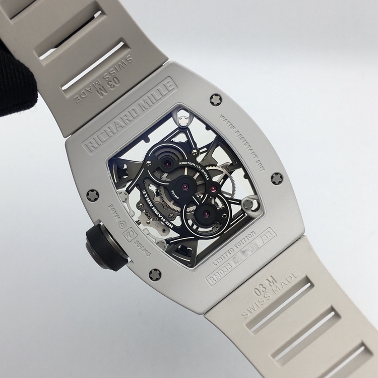 RICHARD MILLE 理查德米勒 男士系列，RM 038。48x39.7毫米表径，镁合金表壳，全镂空酒桶型面盘，陀飞轮装置，RM 038手动上弦机械机芯，动力储备48小时。 单表无附件。