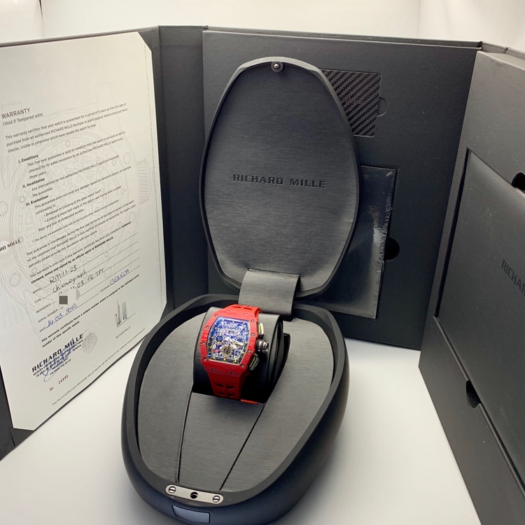 RICHARD MILLE 理查德米勒 男士系列，RM11-03，红魔。49.94 x 44.5毫米表径，NTPT表壳，镂空酒桶型面盘，12点位置日期显示，计时功能，自动上弦机械机芯。 全套附件齐全。
