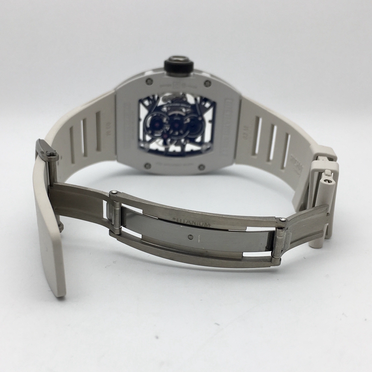 RICHARD MILLE 理查德米勒 男士系列，RM 038。48x39.7毫米表径，镁合金表壳，全镂空酒桶型面盘，陀飞轮装置，RM 038手动上弦机械机芯，动力储备48小时。 单表无附件。