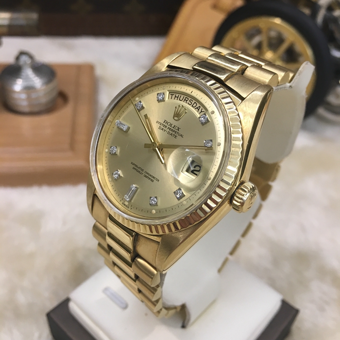 Rolex 劳力士 星期日历型系列，118348。36毫米表径，18K黄金表壳。香槟色面盘，中央时、分及秒针，表面设瞬跳日历及星期显示。自动上弦机械机芯，动力储备48小时。 单表无附件。?