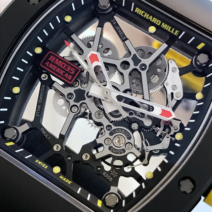 RICHARD MILLE 理查德米勒 男士系列，RM035 AMERICAS。42*50毫米表径，黑钛表壳，镂空机械机芯，黄圈美洲特别版，限量50枚。 单表无附件。
