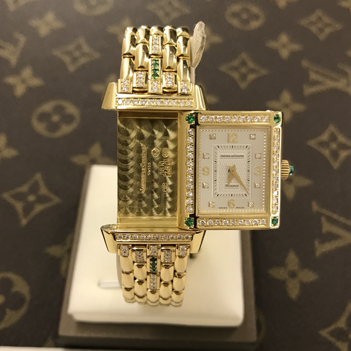 Jaeger-LeCoultre 积家 翻转系列 267.1.86。33X20.5毫米表径，18K黄金表壳，绿宝石镶钻，蓝宝石水晶玻璃表镜，精准石英机芯。 单表无附件。